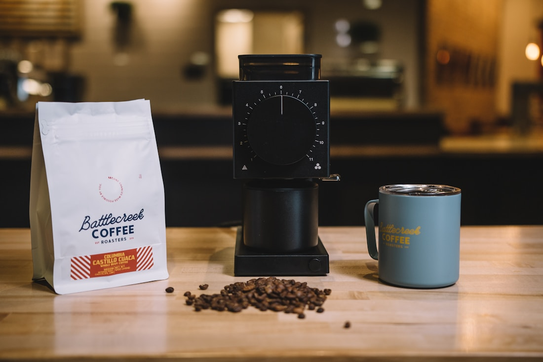 Coffee beans and brewing tools on a cafe table